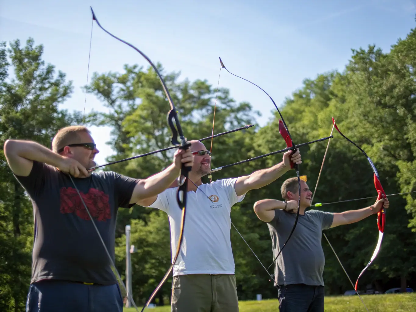 A scenic image of archers participating in an outdoor archery event in a natural setting, emphasizing the connection with nature and the community aspect of the activity.